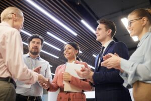 business-handshake-at-office-e1608772082571.jpg